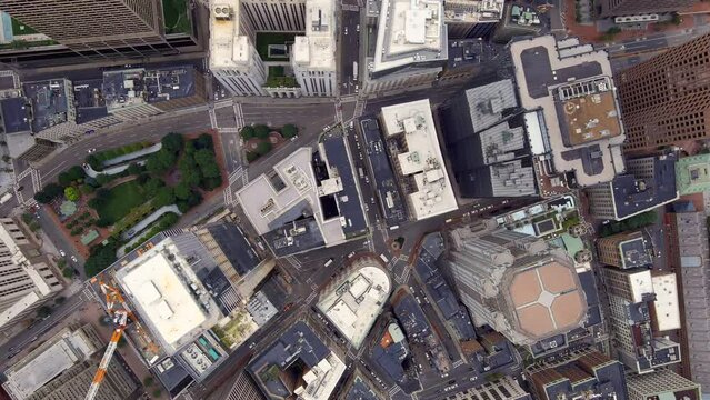 Boston high rise rooftops aerial view looking down at network of urban Massachusetts city streets