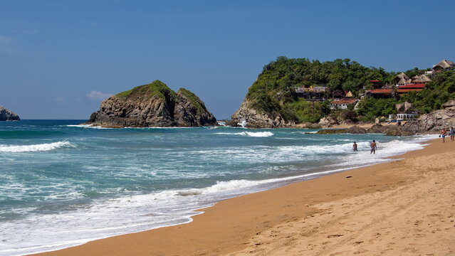Waves breaking on the beach in Zipolite, Mexico