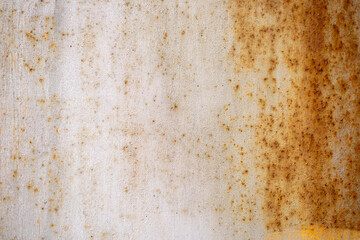 Texture of rusty iron, cracked paint on an old metal surface. Sheet of rusty metal with cracked and peeling paint, background for design with copy space.