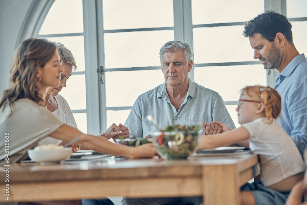 Sticker Big family, food and praying for gratitude and healthy lunch together while holding hands for love, religion and thanksgiving. Men, women and child together for healthy eating at home dining table