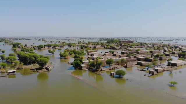 Aerial Panoramic View Of Rural Buildings Submerged In Flood Water In Mehar, Sindh, Pakistan 