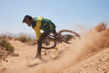 Mountain bike, dust and man cycling on dirt path for action, speed and travel adventure for sports...