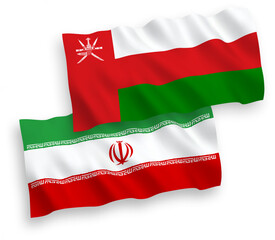 National vector fabric wave flags of Sultanate of Oman and Iran isolated on white background. 1 to 2 proportion.