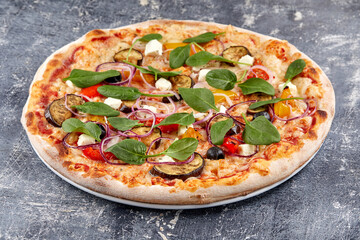 tasty pizza on the wooden background