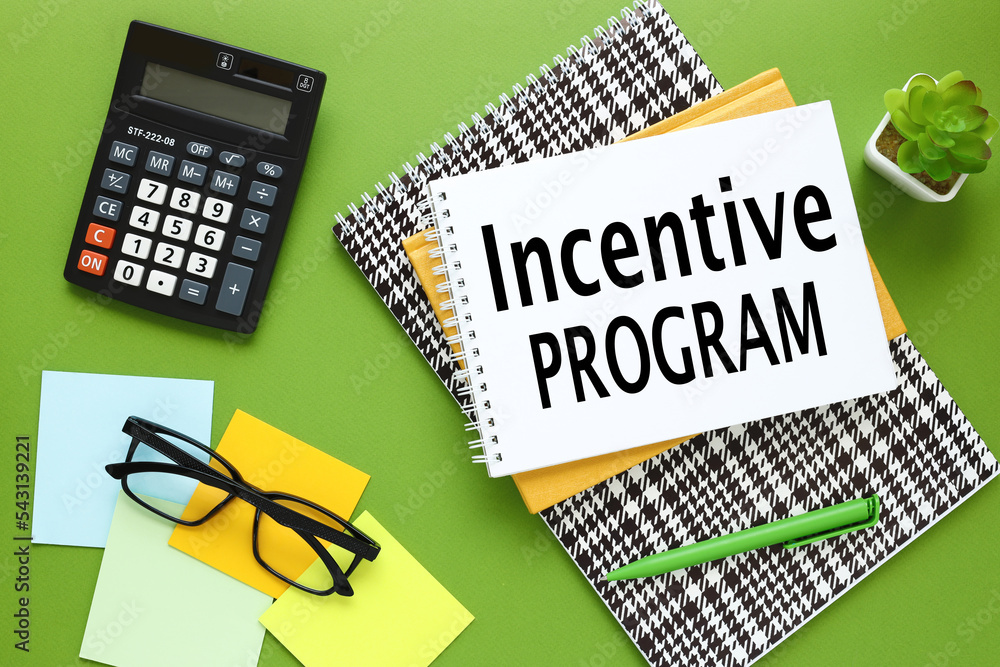Poster incentive program notepad and text near calculator and glasses