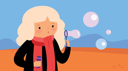 girl blowing soap bubbles in autumn park