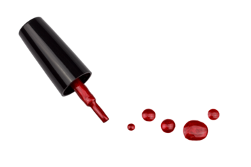 nail polish, brush and drops of polish, top view
close-up
