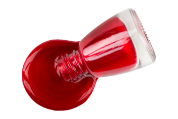 nail polish, a jar of polish in a puddle of polish,
close-up