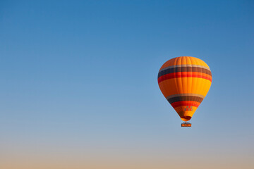 Balloon at dusk in Cappadocia. Famous flight in Goreme. Turkey