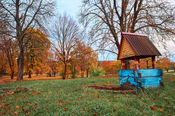 Well in an autumn park in Kyiv, Ukraine.