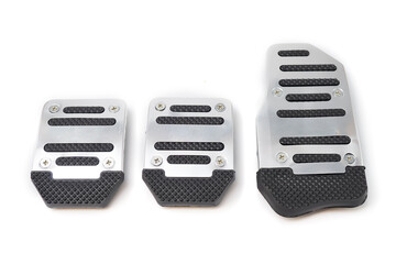 aluminum cover of manual car pedal, gas, clutch and brake isolated on white background.