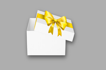 White box with yellow ribbon bow mockup isolated on background.3d rendering.
