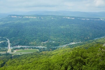 A high observation point with a view of the surrounding landscape. The natural beauty of the surrounding space.