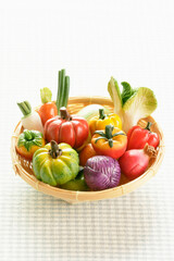 miniature fresh vegetables in basket