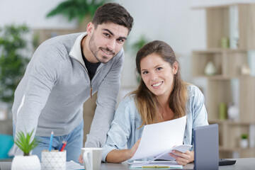 young couple managing finances together