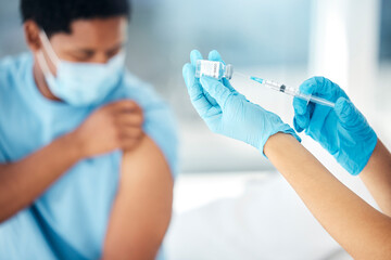 Doctor hands giving covid vaccine injection to patient for healthcare safety, medical service and bacteria risk protection in clinic. Nurse prepare syringe, vial and corona virus flu shot medicine