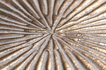 Beautiful golden textured surface as background, closeup