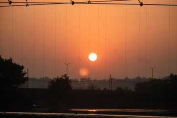 Sun Shine Over Blue Water Lake Or River At Sunrise. Nature At Sunny Morning. Woods With Orange...