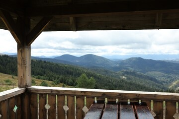 Picturesque view of mountain landscape from wooden gazebo