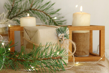 Christmas candles with evergreen decorations.
