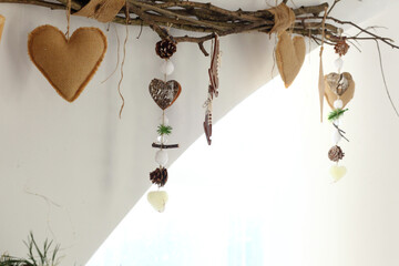 Vintage Christmas decorations hanging on string