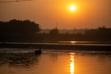 Sun Shine Over Blue Water Lake Or River At Sunrise. Nature At Sunny Morning. Woods With Orange...