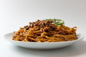Dandan noodles on a white background