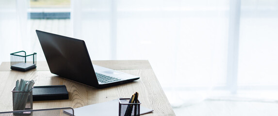 Close up view of workplace with computer