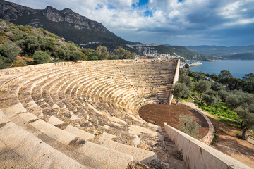 Greek theatre in ancient Greek city of Antiphellos, near modern day Kas, Turkey. - obrazy, fototapety, plakaty