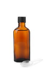 Bottle of syrup with plastic spoon on white background. Cough and cold medicine