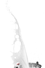 Milk Spilling Out Of A Measuring Cup