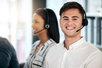 Man, consultant and call center with smile for customer service, telemarketing or advice at the...