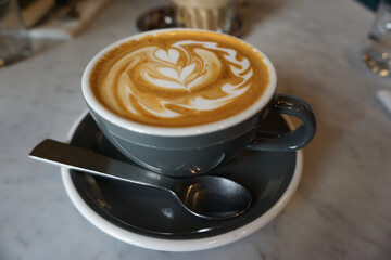 cup of cappuccino with cinnamon