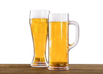 Cold beer with foam in glasses, close-up