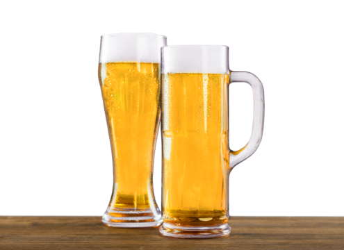 Cold beer with foam in glasses, close-up