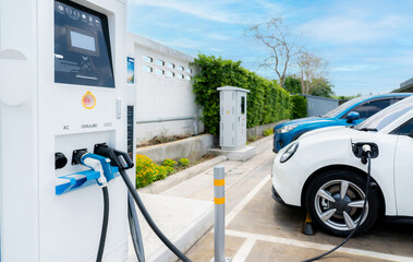 Car charging at electric car charging station. Electric vehicle charger. Charging point at car...