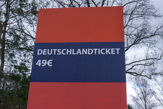 Sign shows "Deutschlandticket" which means train ticket for germany