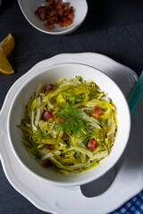 White cabbage with dill and diced bacon