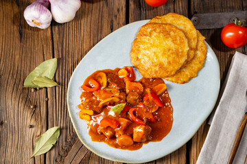 Hungarian goulash with potato pancakes