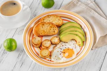 Fried eggs with avocado