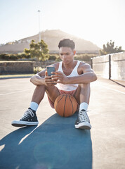 Phone, fitness and basketball man relax typing training results on mobile app, gaming or reading...