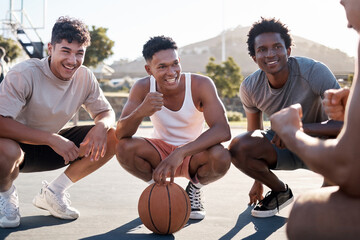 Basketball player, team and group talking for motivation and game strategy planning together with training coach in outdoor sun. Diversity basketball friends talking or listening to motivate speech