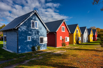 Colorful Scandinavian houses in an autumn scenery. Poland © Patryk Kosmider