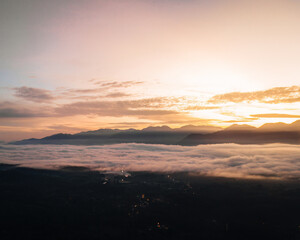Sea clouds during golden sunrise above the Titiwangsa range mountains in Lenggong, Perak.