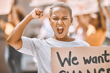 Power, motivation and scream protest of a black woman protesting for social change. Portrait of a...
