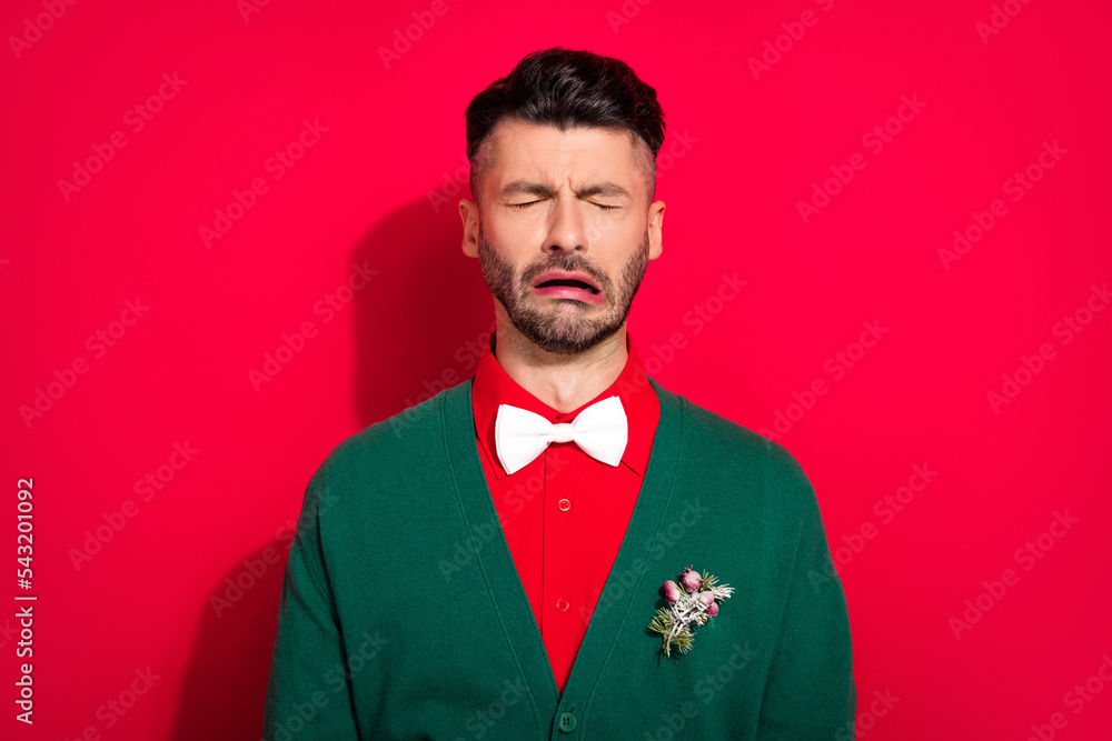 Sticker Photo of unsatisfied offended person closed eyes sullen face cry isolated on red color background