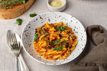 homemade pasta with meat ragu bolognese and kale