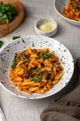 homemade pasta with meat ragu bolognese and kale