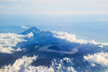 Aerial photo of active volcano Bromo and Semeru in Bromo Tengger Semeru National Park - largest mountain in Java island. Famous travel destinations of Indonesian islands.