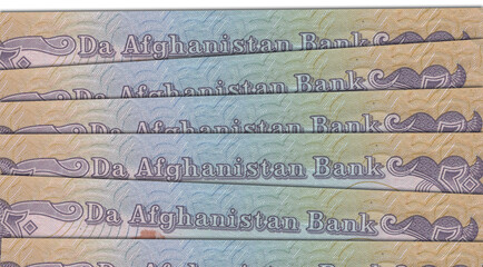 Fototapeta premium Paper money from Afghanistan. Afghan afghani. Close up banknotes from Afghanistan. Afghan currency 3D render